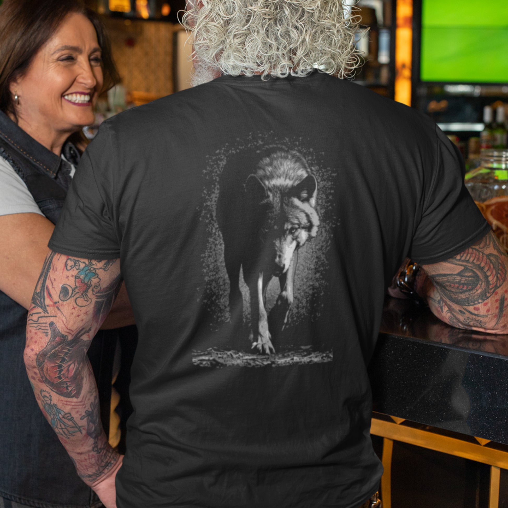 Stalking Wolf Unisex t-shirt - A hunting gray wolf image on back of shirt