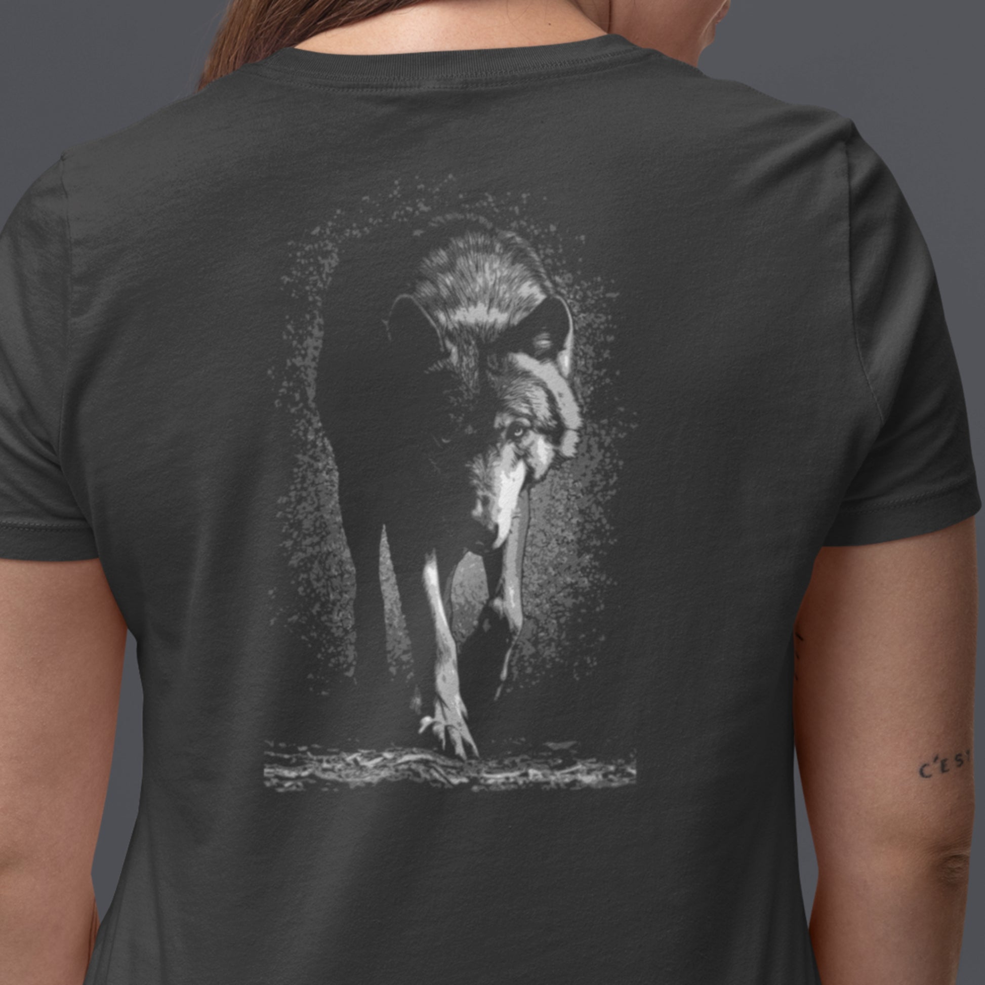 Stalking Wolf Unisex t-shirt - A hunting gray wolf image on back of shirt
