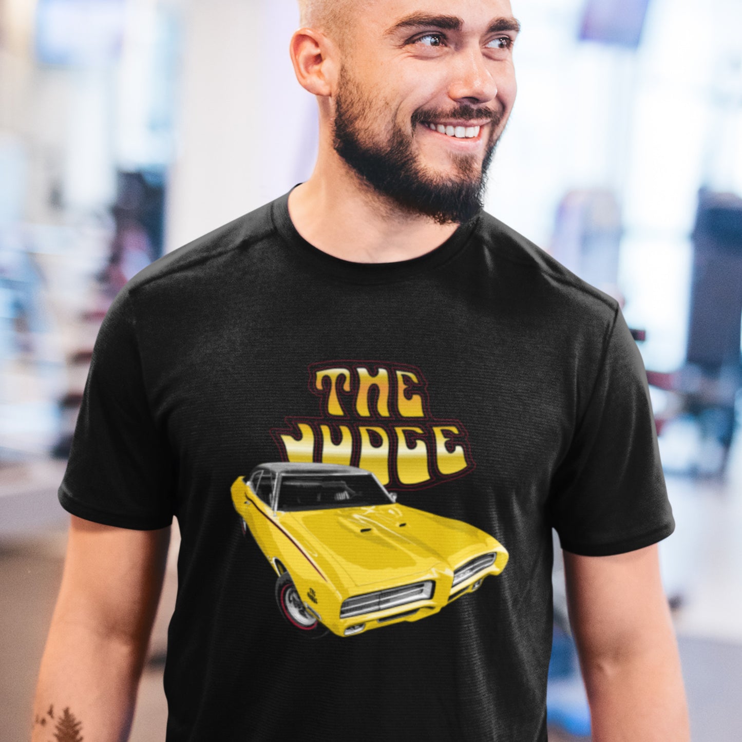 Classic car shirt featuring yellow 1969 Pontiac GTO Judge - Unisex T-shirt - 60's muscle car